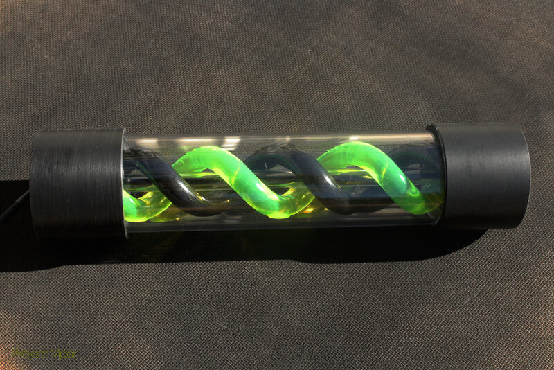 Green spiral in a tube
