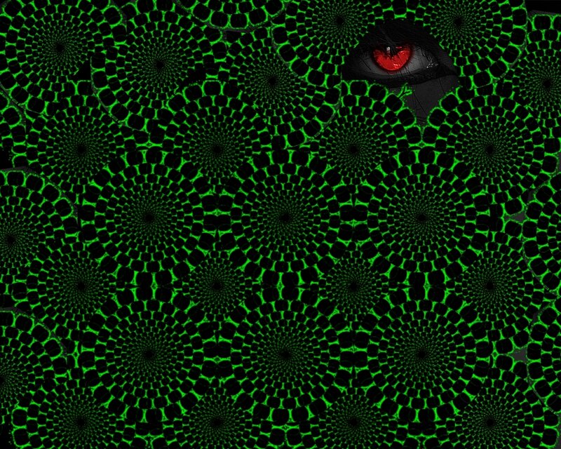 green spiral pattern with red eye