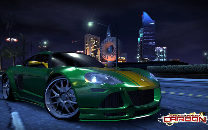 Green sports car at night