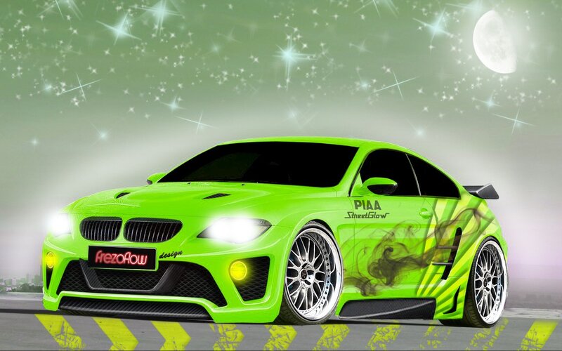 green sports car at night