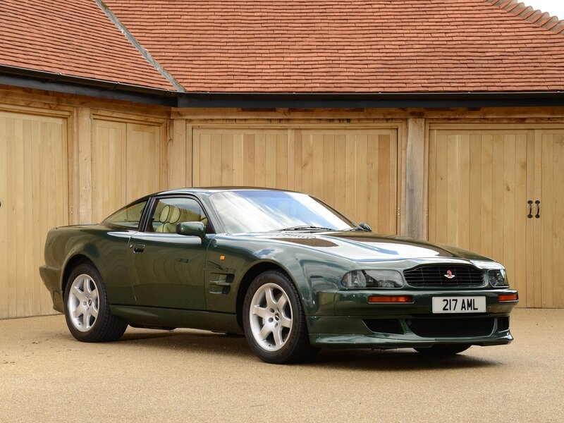 Green Sports Car — Calm, Afternoon, Photograph, Wooden Garage