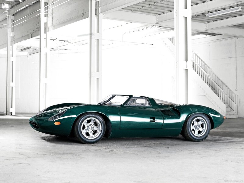 Green Sports Car — Calm, Photograph, Building Interior