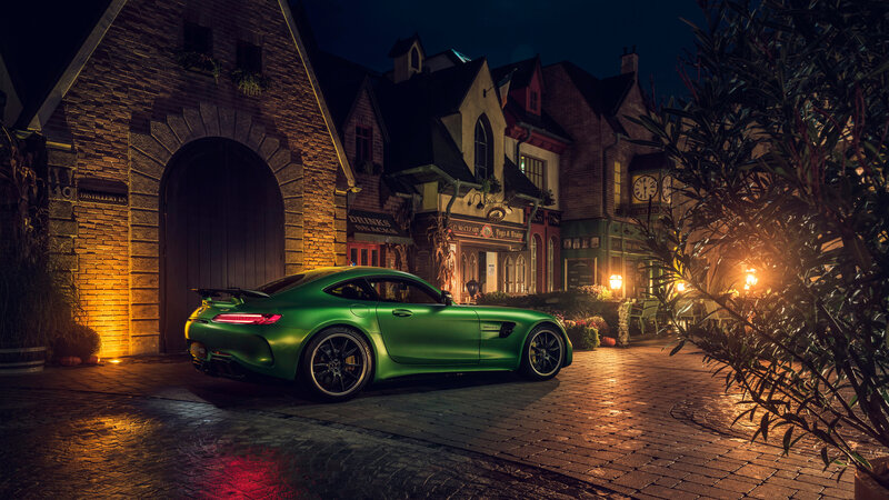Green Sports Car — Dramatic, Night, Photograph, Brick Buildings