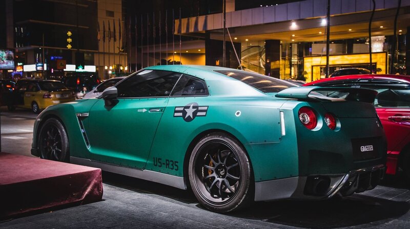 Green Sports Car — Dramatic, Night, Photograph, Building