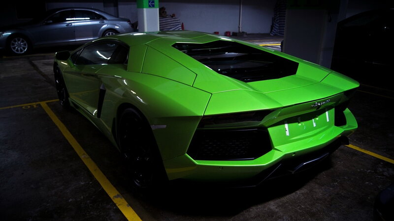Green Sports Car — Dramatic, Night, Photograph, Parking Garage