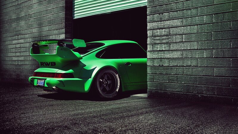 Green Sports Car — Dramatic, Photograph, Brick Wall