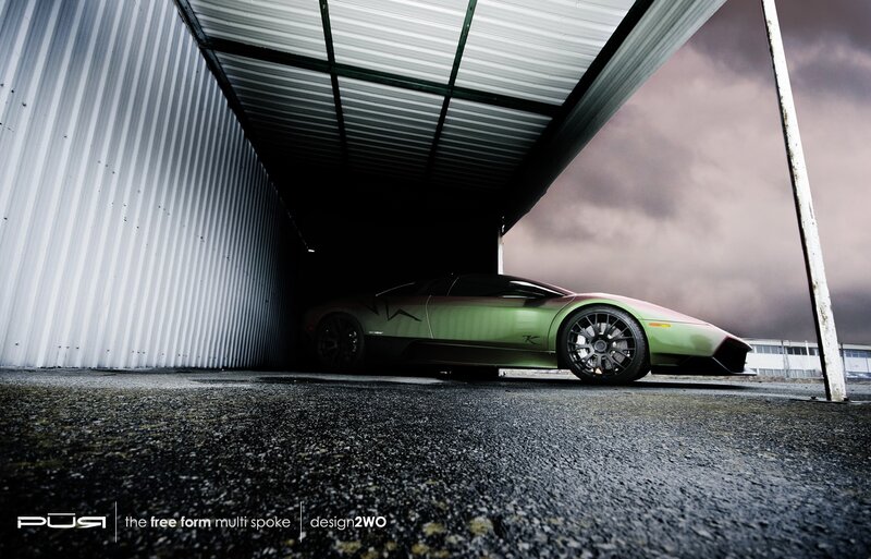 Green Sports Car — Dramatic, Photograph, Building, Sky