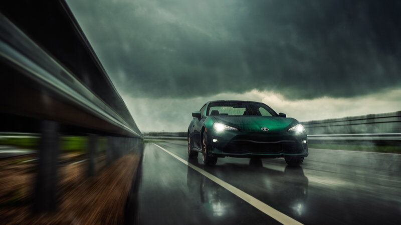 Green Sports Car — Dramatic, Photograph, Road, Stormy Sky