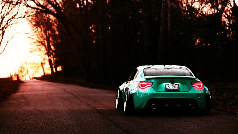Green Sports Car — Dramatic, Sunset, Photograph, Road, Trees