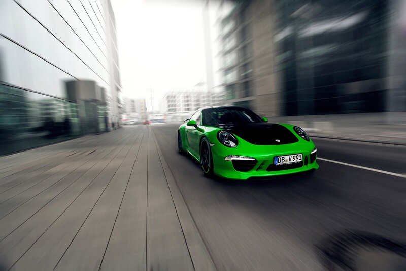 Green Sports Car — Dynamic, Photograph, Building