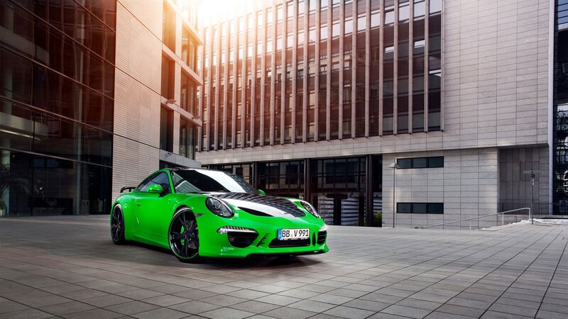 green sports car in city