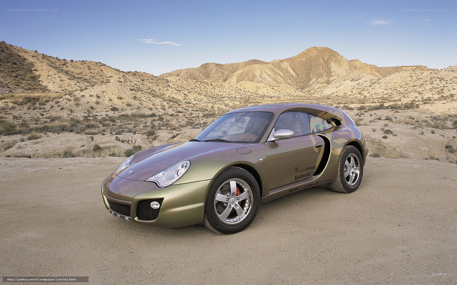 green sports car in desert