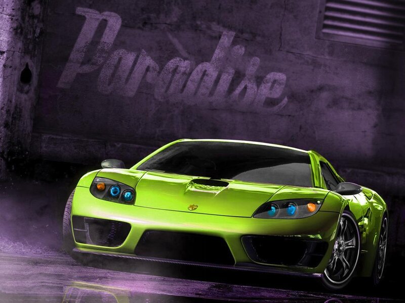 green sports car in garage