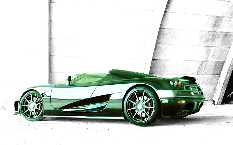 green sports car in garage