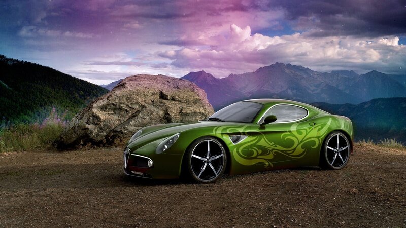 green sports car in mountains