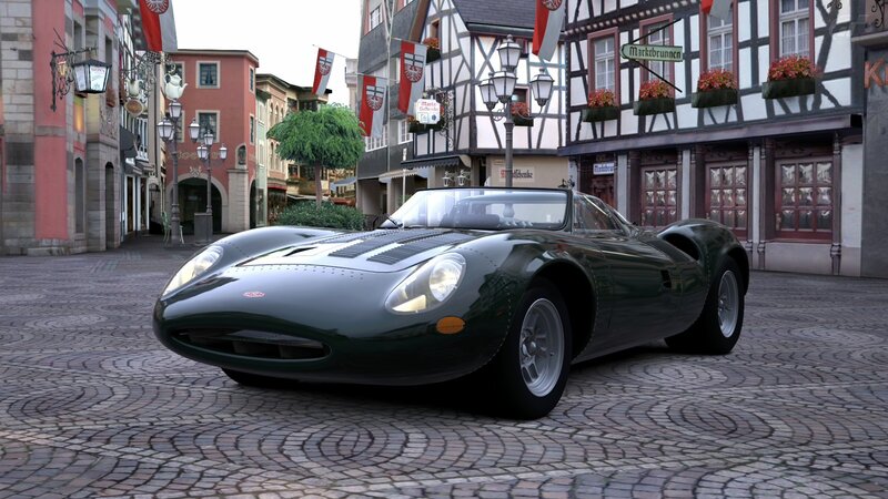 Green sports car in town square