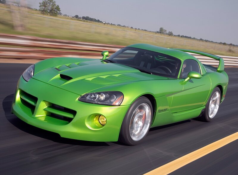 Green sports car on a racetrack