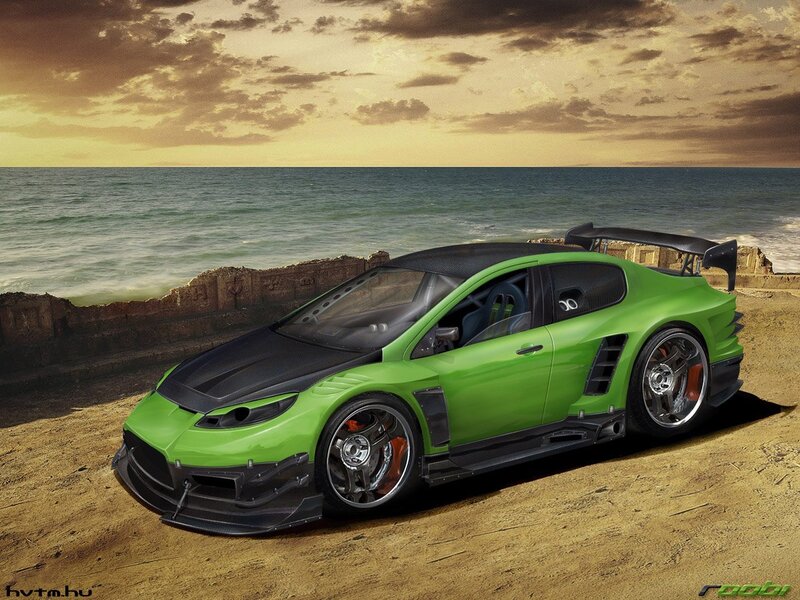 Green sports car on beach