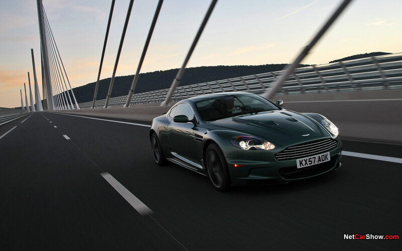 green sports car on bridge