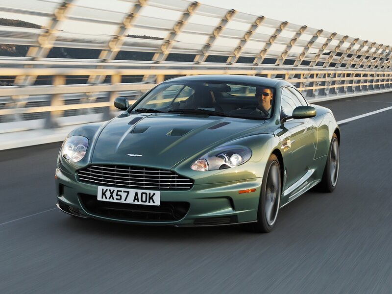 green sports car on bridge