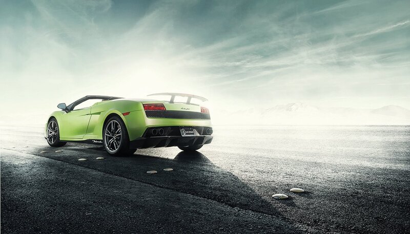 green sports car on desert road