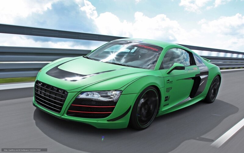 green sports car on racetrack