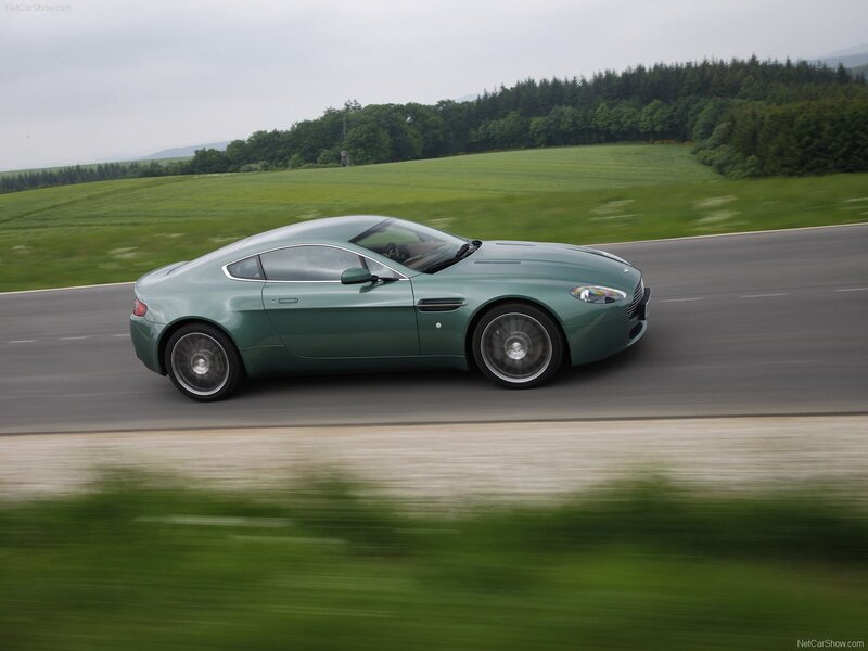 green sports car on road
