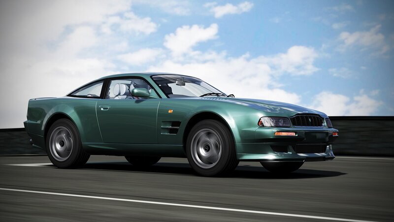 green sports car on road