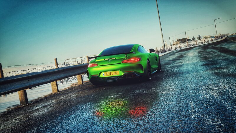 Green Sports Car on Road — Dramatic, Winter