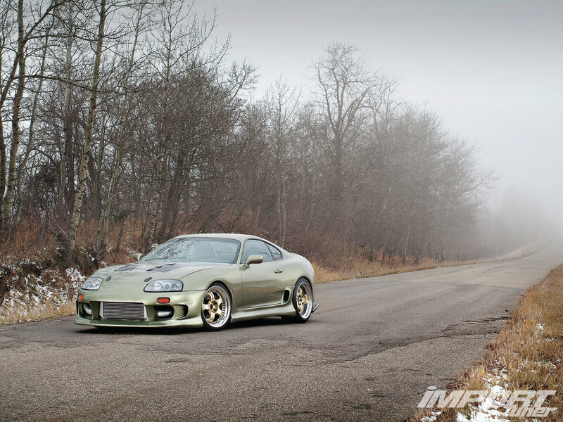 Green Sports Car on Road — Gray