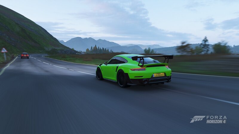 Green Sports Car on Road — Serene, Morning