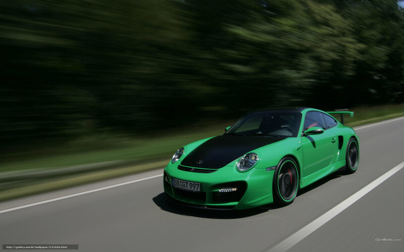 green sports car on road
