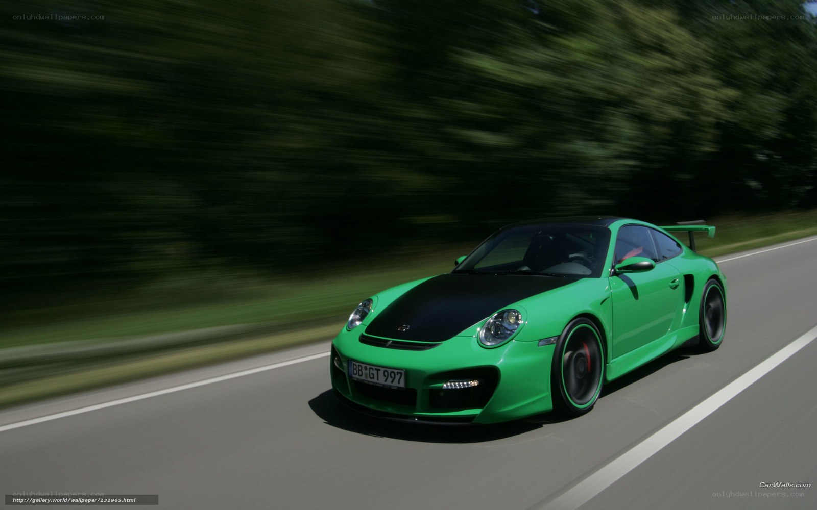 green sports car on road