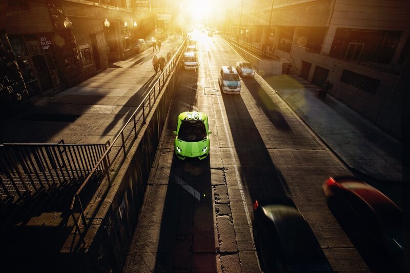 Green Sports Car on Street — Dramatic