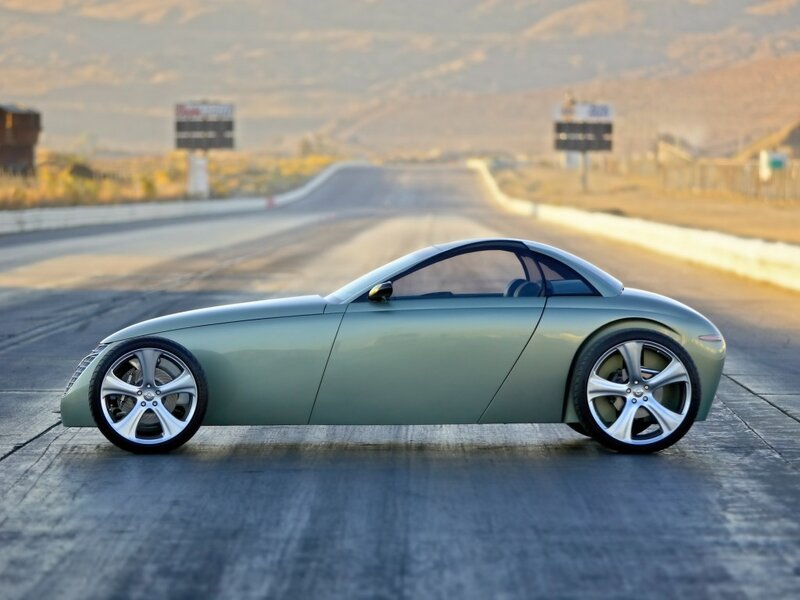 green sports car on track