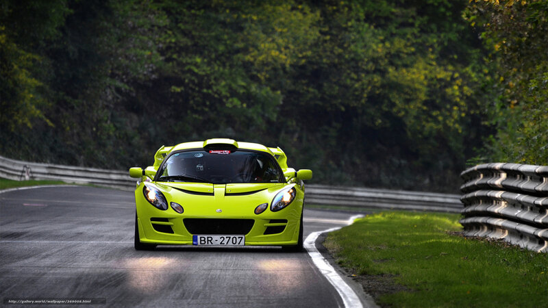 green sports car on track
