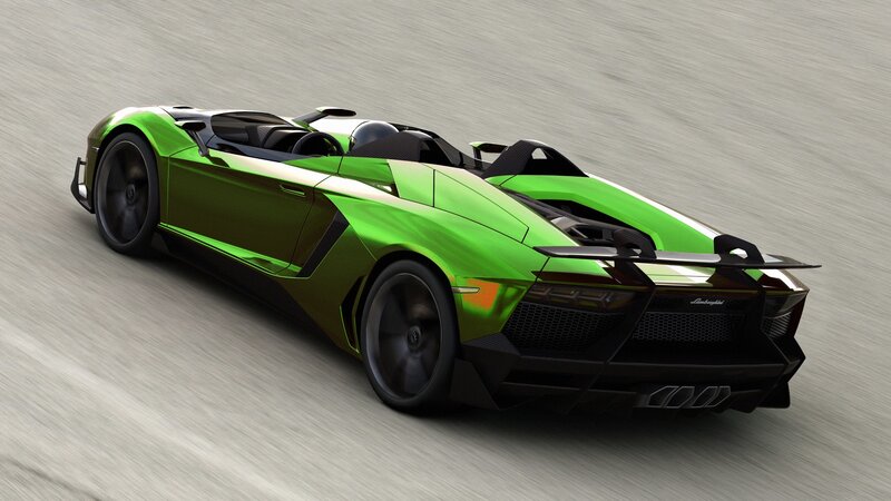 green sports car on track