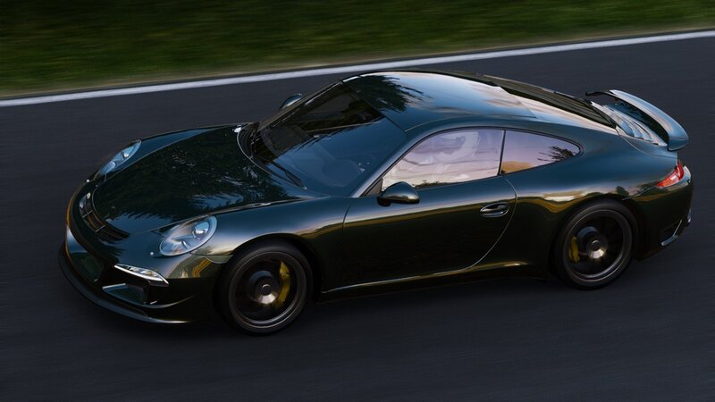 green sports car on track