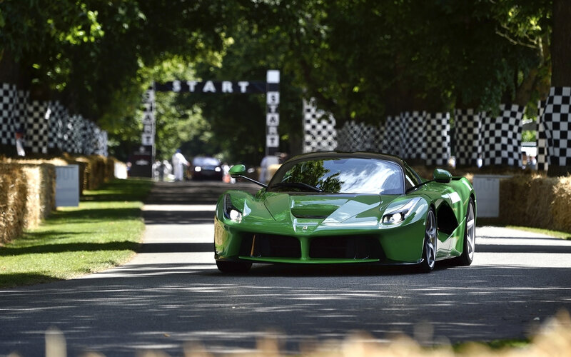 Green Sports Car on Track — Dramatic