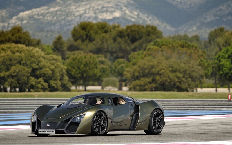 Green Sports Car on Track — Dynamic