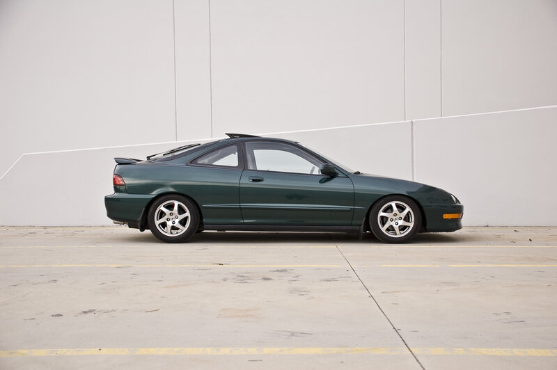 green sports car parked