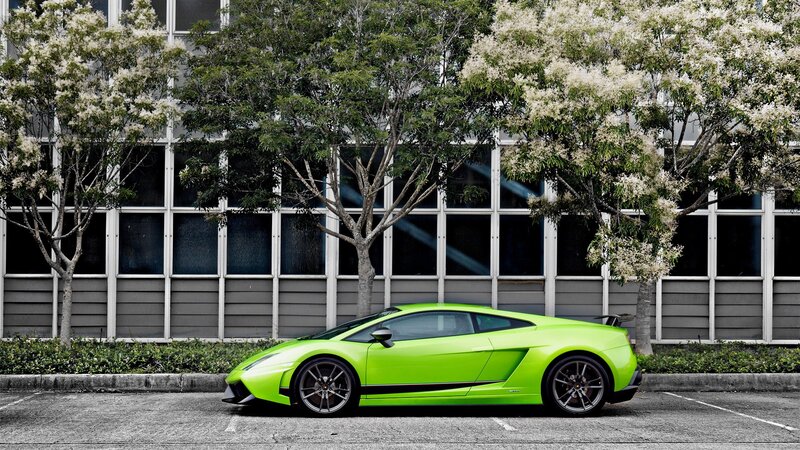 green sports car parked