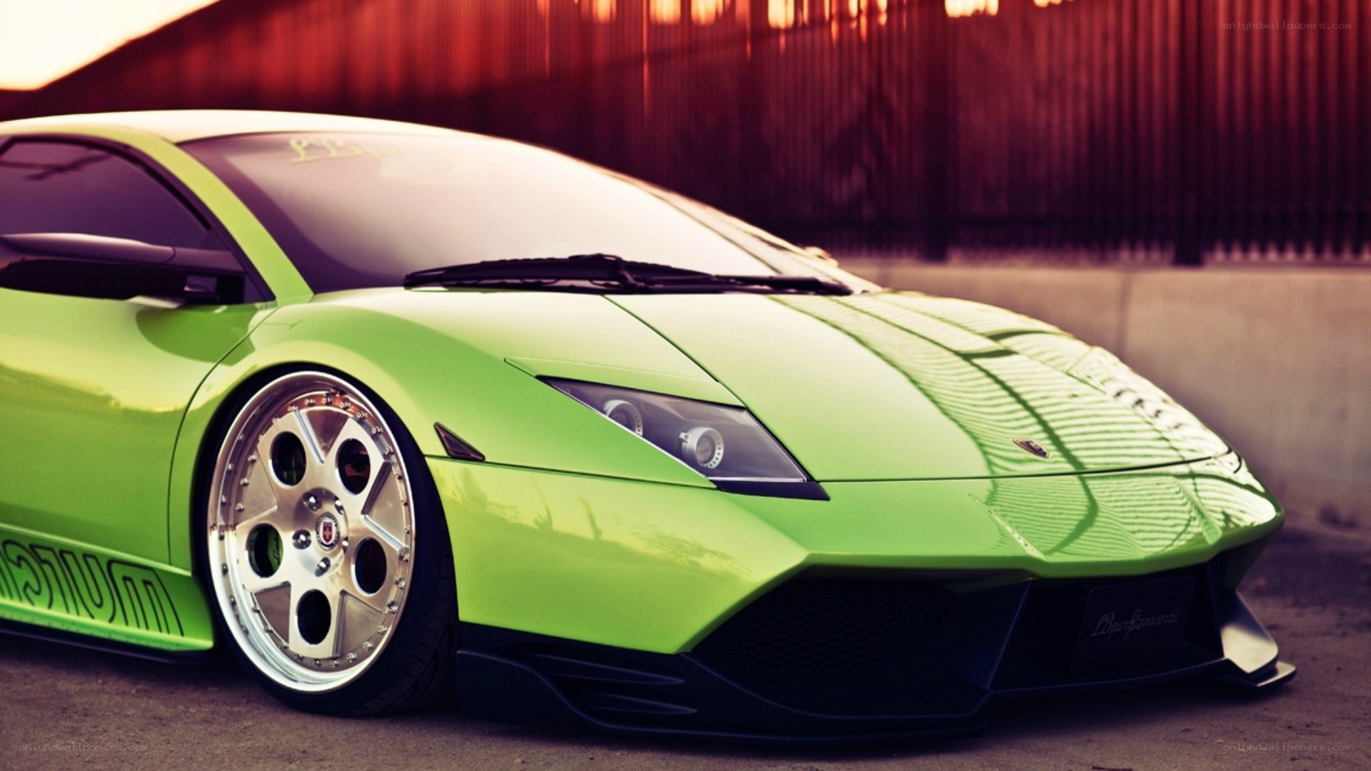 green sports car parked