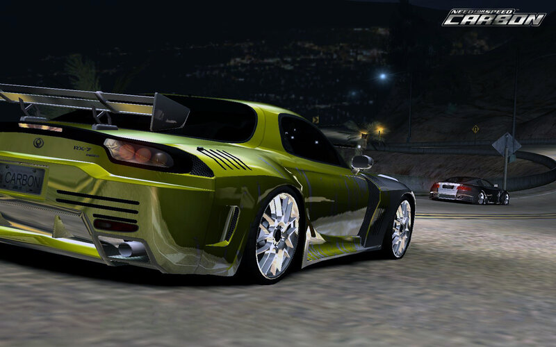 Green sports car racing at night