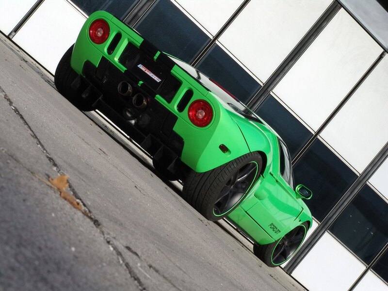 green sports car rear view