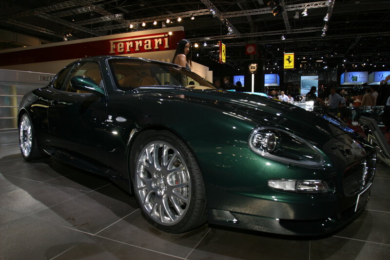 Green Sports Car — Showroom, Photograph, Woman
