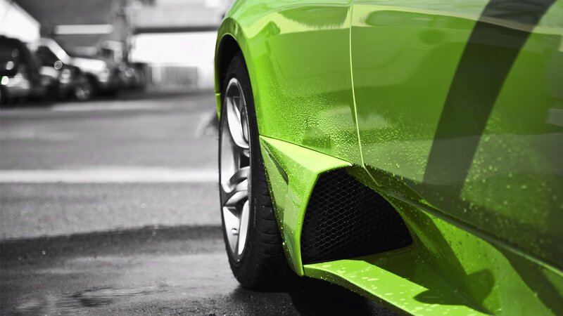 green sports car wheel