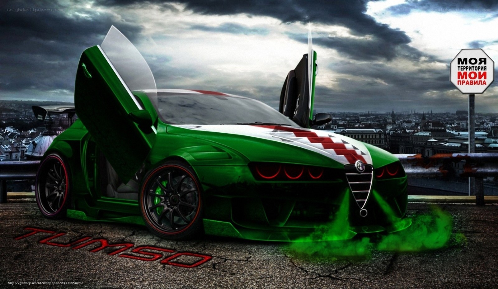 green sports car with open doors