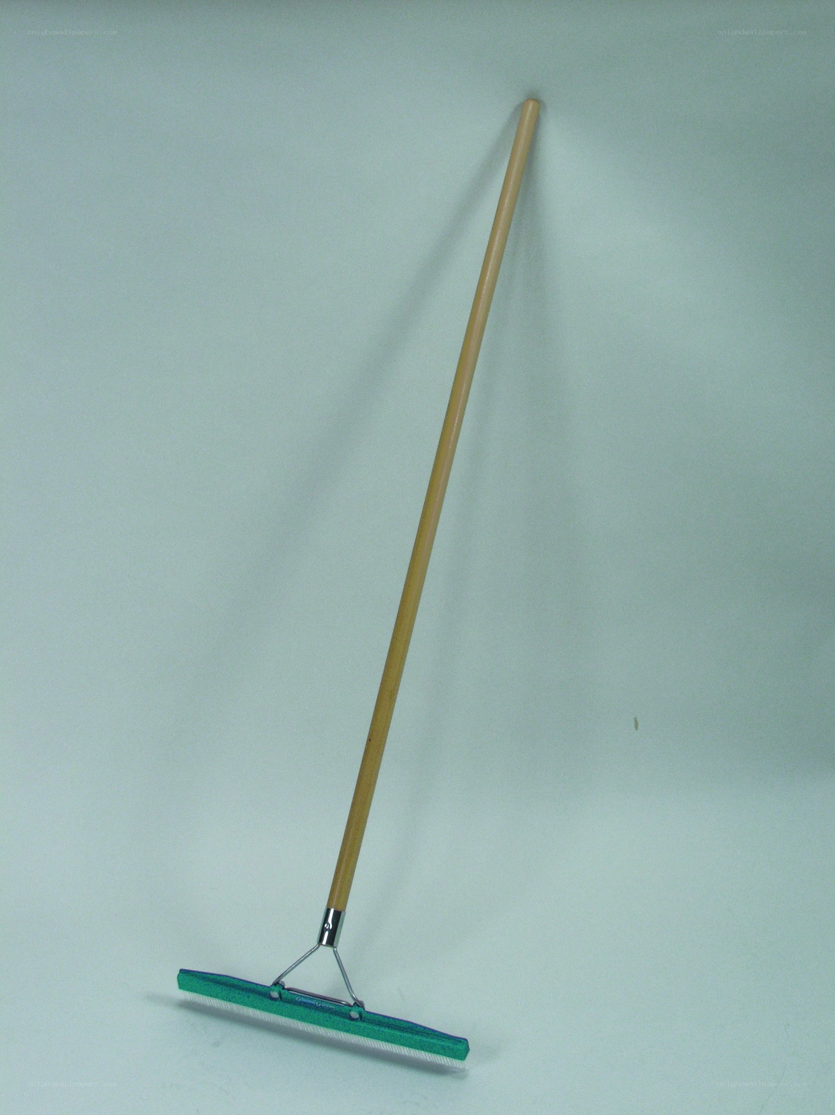 green squeegee with wooden handle