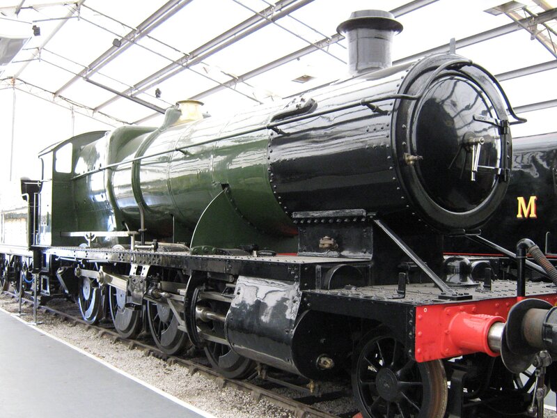 Green steam locomotive on display